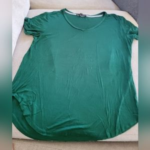 Women's Medium Elite collection, green top, very soft material.